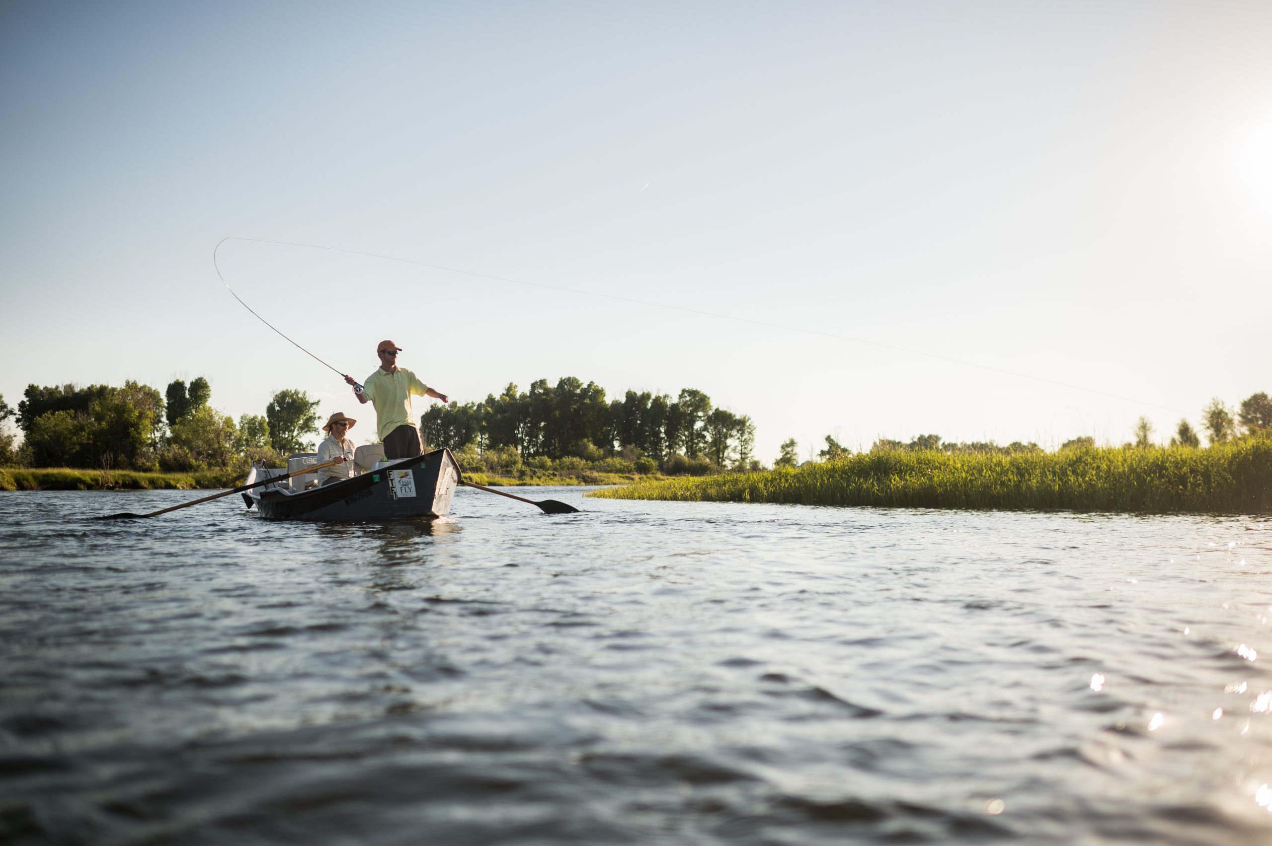 Fishermen enjoy a beautiful late summer day on the water.